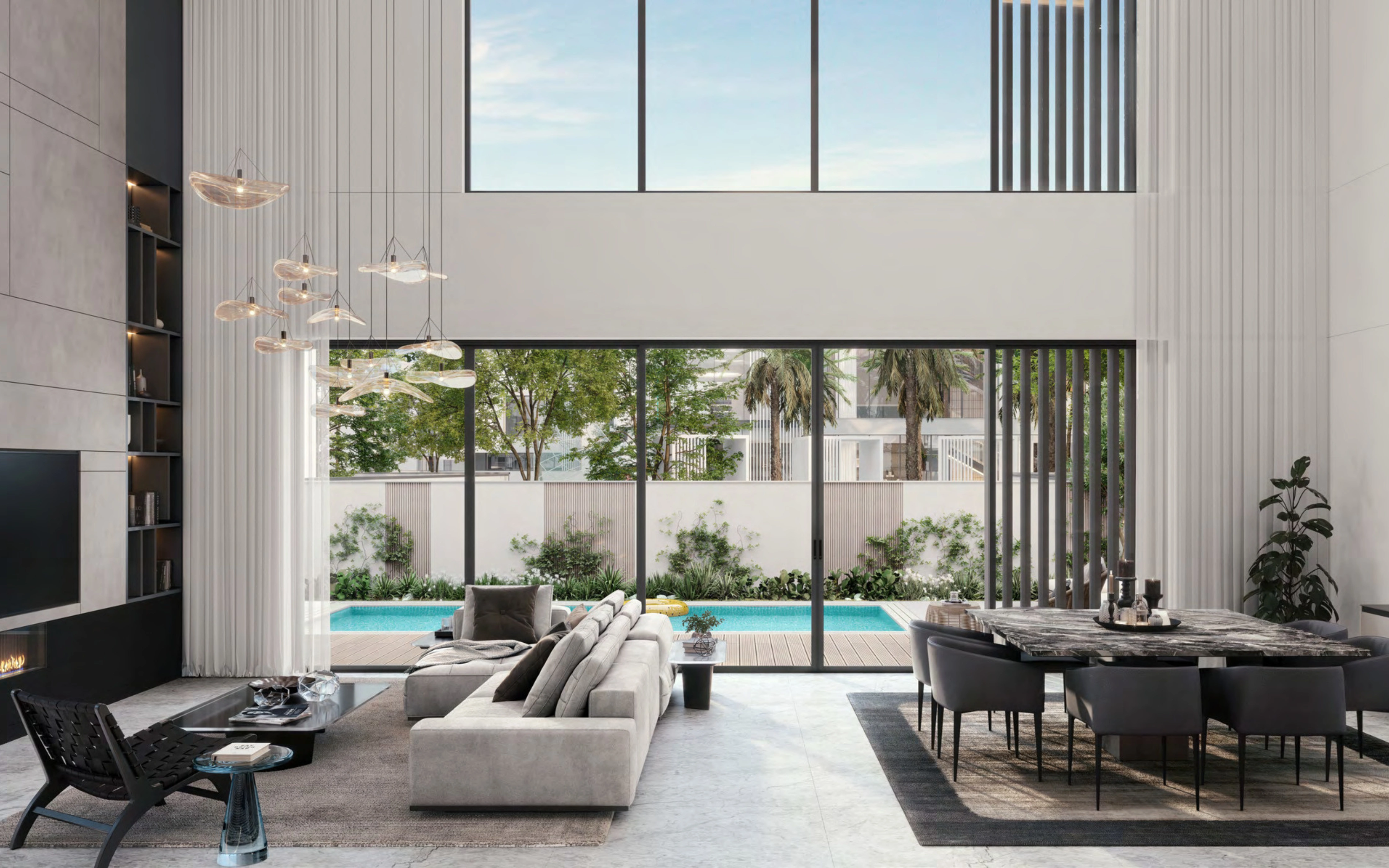 Ellington high-ceiling villa living hall opening to private pool